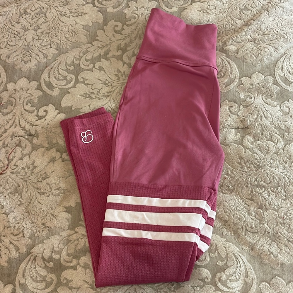 Bombshell Sportswear Small sock stripe leggings. 87% polyester, 13% spandex.